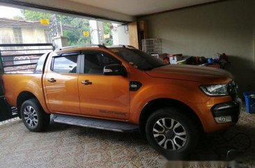 Orange Ford Ranger 2016 Automatic Diesel for sale in Manila