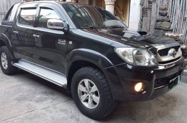 Black Toyota Hilux 2010 at 85000 km for sale in Manila