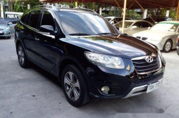 Black Hyundai Santa Fe 2012 at 67873 km for sale in Pasig