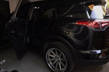 Selling Black Toyota Rav4 2016 Automatic Gasoline in Quezon City