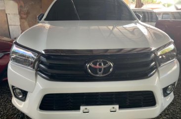 White Toyota Hilux 2016 Manual Diesel for sale in Quezon City