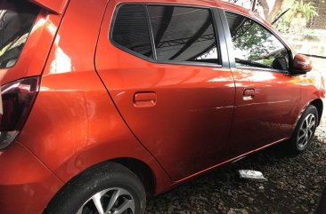 Orange Toyota Wigo 2019 Manual Gasoline for sale in Quezon City