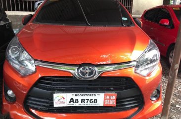 Orange Toyota Wigo 2019 Manual Gasoline for sale in Quezon City