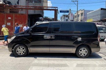 Black Hyundai Grand Starex 2011 at 85000 km for sale 