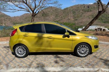 Yellow Ford Fiesta 2016 Hatchback Automatic Gasoline for sale in Manila