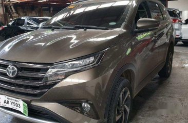 Brown Toyota Rush 2019 for sale in Quezon City 