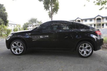 Selling Black Bmw X6 2011 Automatic Gasoline at 52000 km 