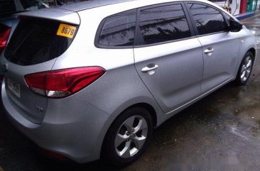 Silver Kia Carens 2014 Manual Gasoline for sale 