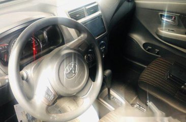 Orange Toyota Wigo 2018 for sale in Quezon City 