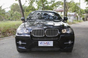 Selling Black Bmw X6 2011 Automatic Gasoline at 52000 km 