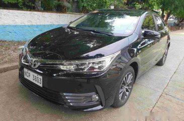 Black Toyota Corolla Altis 2018 at 15000 km for sale