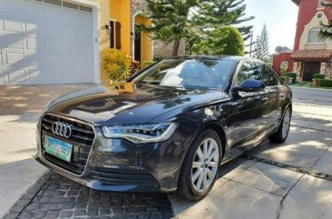 Black Audi A6 2013 at 49000 km for sale