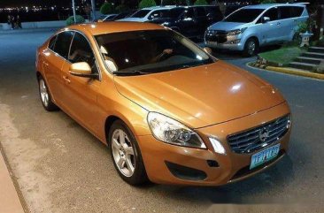 Orange Volvo S60 2011 Automatic Gasoline for sale