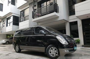 Black Hyundai Grand Starex 2014 at 47000 km for sale