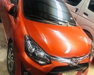 Orange Toyota Wigo 2018 for sale in Quezon City 