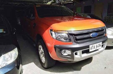 Orange Ford Ranger 2015 at 57049 km for sale 