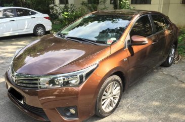 Brown Toyota Corolla 2014 for sale in Quezon City