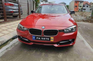 Red Bmw 320D 2013 at 19500 km for sale 