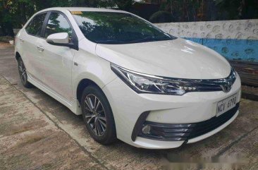 Selling White Toyota Corolla Altis 2018 Automatic Gasoline at 7000 km 