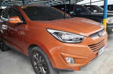 Orange Hyundai Tucson 2014 Automatic Gasoline for sale