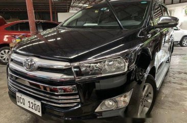 Selling Black Toyota Innova 2016 at 18000 km
