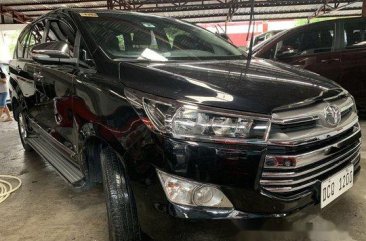 Selling Black Toyota Innova 2016 at 18000 km