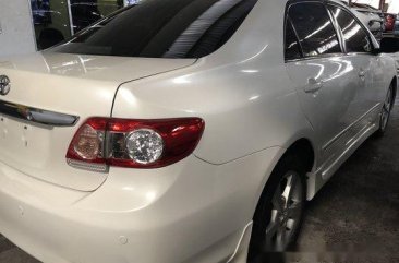 White Toyota Corolla Altis 2013 for sale in Quezon City 