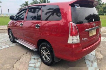 Red Toyota Innova 2010 Manual Diesel for sale