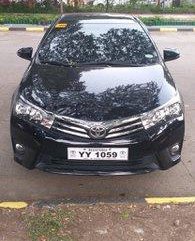 Sell Black 2016 Toyota Corolla Altis at 13000 km 