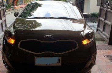 Brown Kia Carens 2014 Automatic Diesel for sale 