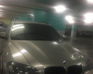 Selling Silver Bmw X5 2010 at 57000 km 