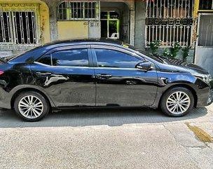 Sell Black 2014 Toyota Corolla Altis at 75000 km