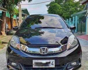 Selling Black Honda Mobilio 2015 Automatic Gasoline at 30000 km 