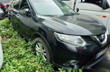 Black Nissan X-Trail 2015 at 55000 km for sale 