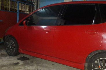 Red Honda Fit 2008 at 95000 km for sale