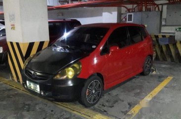 Red Honda Fit 2008 at 95000 km for sale
