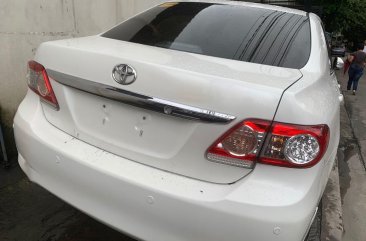 White Toyota Corolla Altis 2013 for sale in Quezon City 