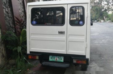 Sell White 2013 Mitsubishi L300 in Quezon City