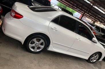 Selling White Toyota Corolla Altis 2013 in Quezon City