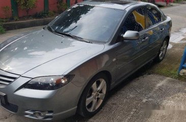 Selling Grey Mazda 323 2006 at 65000 km 