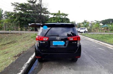 Selling Black Toyota Innova 2017 at 35000 km