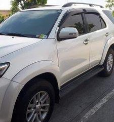 Selling White Toyota Fortuner 2014 at 56000 km