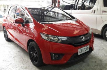 Red Honda Jazz 2015 at 35000 km for sale