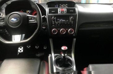 Red Subaru Wrx 2015 at 21000 km for sale 