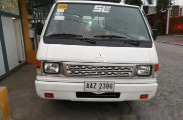 Selling White Mitsubishi L300 2014 in Quezon City