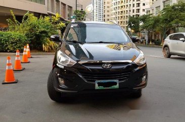 Black Hyundai Tucson 2011 at 37000 km for sale 