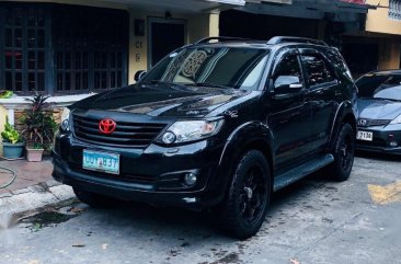 Selling Black Toyota Fortuner 2012 in Quezon City