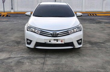 Sell Pearl White 2016 Toyota Corolla Altis in Imus