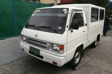 Selling White Mitsubishi L300 2013 in Quezon City