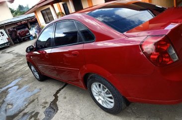 Red Chevrolet Optra 2004 for sale in Manual